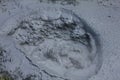 Top view of volcanic mudpot in the town of Hveragerdi in Iceland