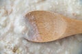 Top view of warm canned chowder with a wood spoon