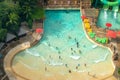 Top view of water park with many traveler have fun swimming pool in Sentosa, Singapore Royalty Free Stock Photo