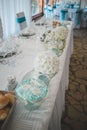 Top view of wedding table set up with beautiful flowers as centerpieces Royalty Free Stock Photo