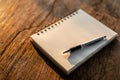 Top view of white book on old wooden plank background Royalty Free Stock Photo