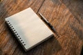 Top view of white book on old wooden plank background Royalty Free Stock Photo