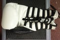 Top view of a white boxing glove with black laces Royalty Free Stock Photo