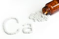 Top View Of White Calcium Pills Pouring Out Of Glass Bottle. Royalty Free Stock Photo