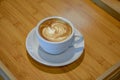 Top view of white Cup of coffee. Cup of hot cappuccino latte coffee on wooden background Royalty Free Stock Photo