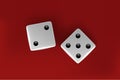 Top view of white dice. Casino dice on red background