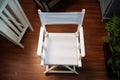 top view of a white directors chair on a film set Royalty Free Stock Photo