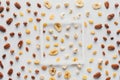 top view of white frame on dried fruits and nuts