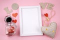 white frame with letters L O V E , heart and jar with hearts Royalty Free Stock Photo