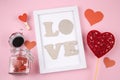 Empty white frame copy space , stuffed toy and jar with red hearts Royalty Free Stock Photo