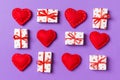 Top view of white gift boxes and red textile hearts on colorful background. Valentine`s Day concept Royalty Free Stock Photo