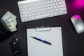 Top view of white keyboard money dollars wallet and credit cards isolated on table. Royalty Free Stock Photo