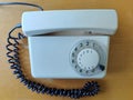 Top view of white old phone on office. Royalty Free Stock Photo