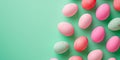 Top view of white and pink easter eggs pattern on green background Royalty Free Stock Photo