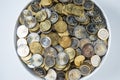 Top of view white plate full of euro coins Royalty Free Stock Photo