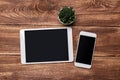 Top view of white tablet blank black screen for advertisement display or other app design with smartphone Royalty Free Stock Photo