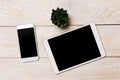 Top view of white tablet blank black screen for advertisement display or other app design with smartphone Royalty Free Stock Photo