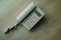 top view white telephone on wooden floor background, object, retro, vintage, fashion, modern, copy space Royalty Free Stock Photo