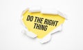 Top view of white torn paper and the text do the right thing on a yellow background Royalty Free Stock Photo