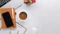 Top view white wooden workspace office desk with computer and office supplies. Flat lay work table with blank notebook, keyboard, Royalty Free Stock Photo