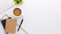 Top view white wooden workspace office desk with computer and office supplies. Flat lay work table with blank notebook, keyboard, Royalty Free Stock Photo