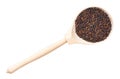 Top view of whole-grain rapeseeds in wood spoon Royalty Free Stock Photo