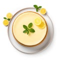 Top view of a whole lemon cheesecake on a plate.
