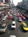 Top view of a wide street with multi-lane traffic, heavy traffic from colorful cars