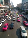 Top view of a wide street with multi-lane traffic, heavy traffic from colorful cars