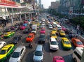 Top view of a wide street with multi-lane traffic, heavy traffic from colorful cars