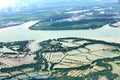 Top View from window airplane, crops field, road, street, river Royalty Free Stock Photo