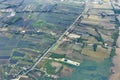 Top View from window airplane, crops field, road, street, river Royalty Free Stock Photo