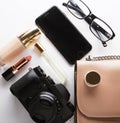 Top view of woman beige bag with accessories smartphone, cosmeti Royalty Free Stock Photo