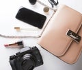 Top view of woman beige bag with accessories smartphone, cosmeti Royalty Free Stock Photo