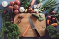 Top view of woman cooking healthy food: cutting vegetable ingredients Royalty Free Stock Photo