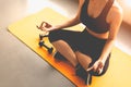 Top view woman doing finger trigger yoga or pay obeisance in fitness workouts training gym center. Lifestyle sport woman sitting