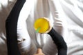 Top view of woman drinking orange juice in bed Royalty Free Stock Photo