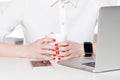 Top view of woman hand holding smart watch. Royalty Free Stock Photo