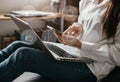 Top view of woman hand using smart phone, mobile payments online shopping,omni docking keyboard computer with virtual interface Royalty Free Stock Photo