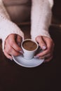 Top view of woman hands with aromatic coffee Royalty Free Stock Photo