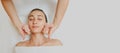 Top view of Woman having curative facial cheeks massage Royalty Free Stock Photo