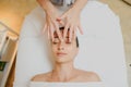 Top view of Woman having curative facial massage Royalty Free Stock Photo