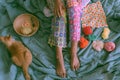 Woman legs with warm in wintertime, crocheted colorful blanket by link many pieces artwork Royalty Free Stock Photo