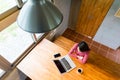 Top view of woman looking at the laptop computer Royalty Free Stock Photo