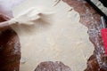 Pulling and stretching pastry dough