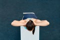 Overhead view of woman pumping press on sports ground of residential area