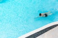 Top view of a woman in the swimming pool. relax time Royalty Free Stock Photo