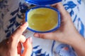 Top view of women hand using petroleum jelly