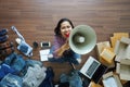 Top view of women holding megaphone advertising message marketing