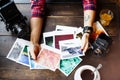 Top view of women`s hands holding printed photos Royalty Free Stock Photo